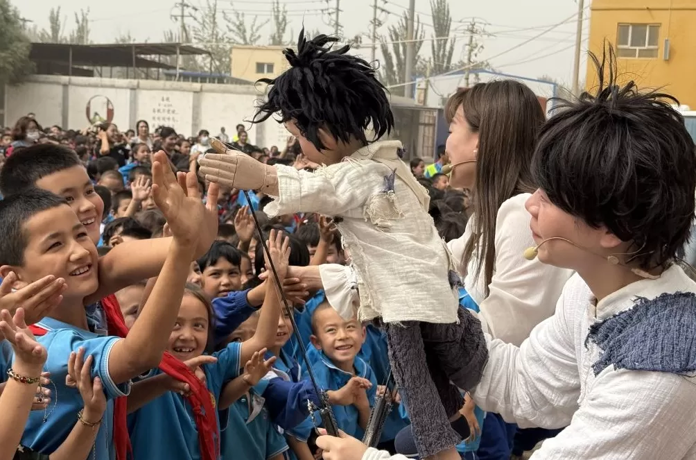 沪喀同心丨上海木偶剧团在新疆：让红色文化“润”入童心-第6张图片-