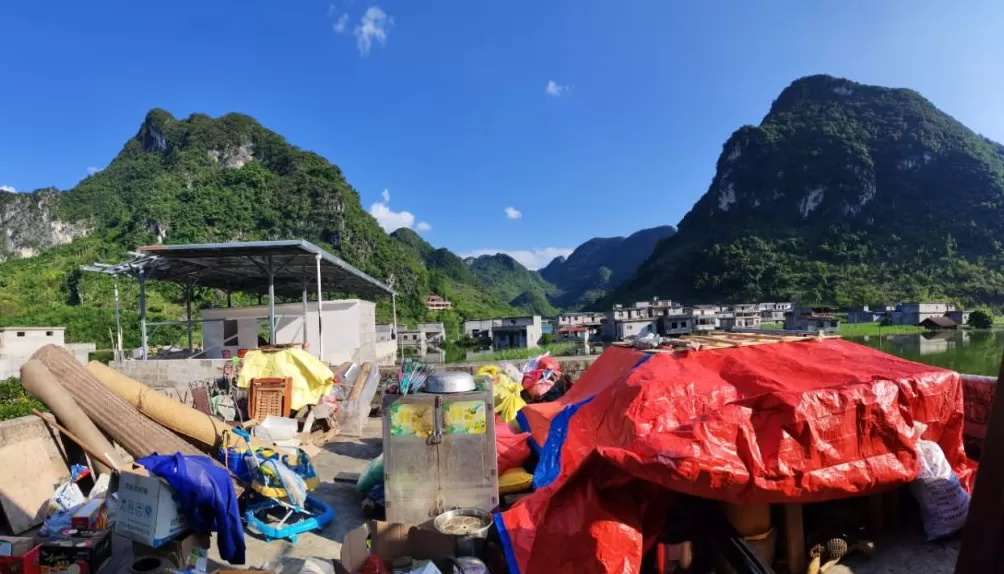 百色“锅底”村庄水患：被浸泡逾半月的家园和生计-第2张图片-