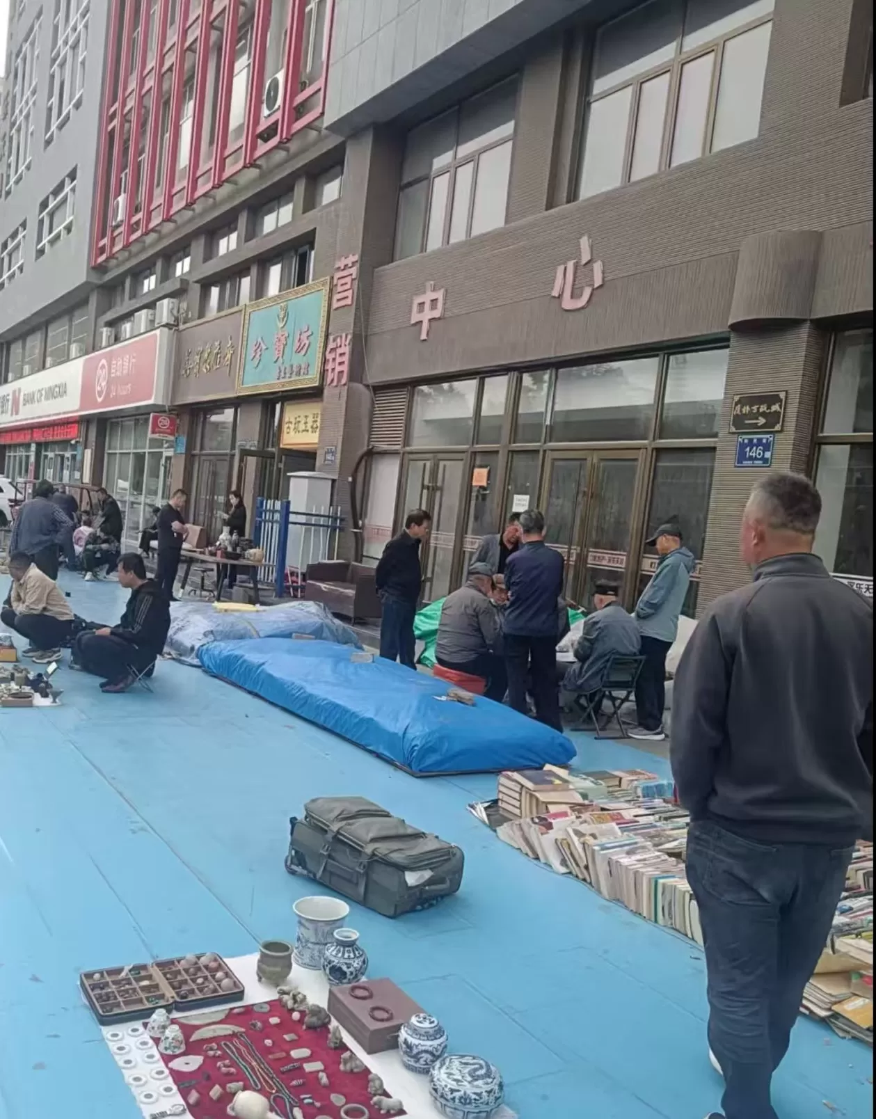 “宁夏最大古玩字画市场”烂尾背后：公然出售法院查封的商铺，众多买铺者遭遇维权难-第2张图片-