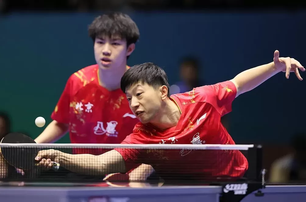马龙首秀！搭档黄友政为北京乒乓队拿下全运会男团第一分-第1张图片-